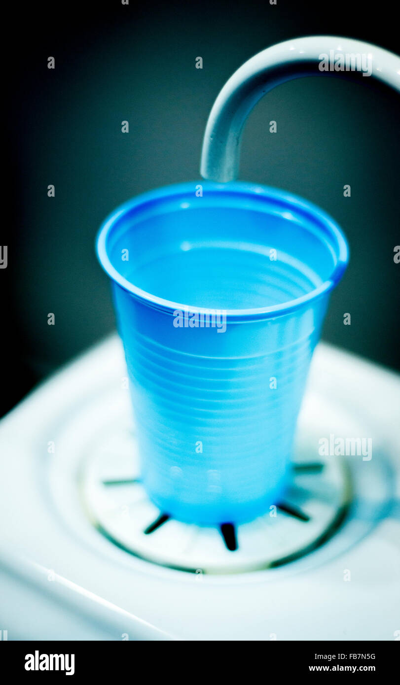 Dentists dental rinse tap and cup in clinic photo. Stock Photo