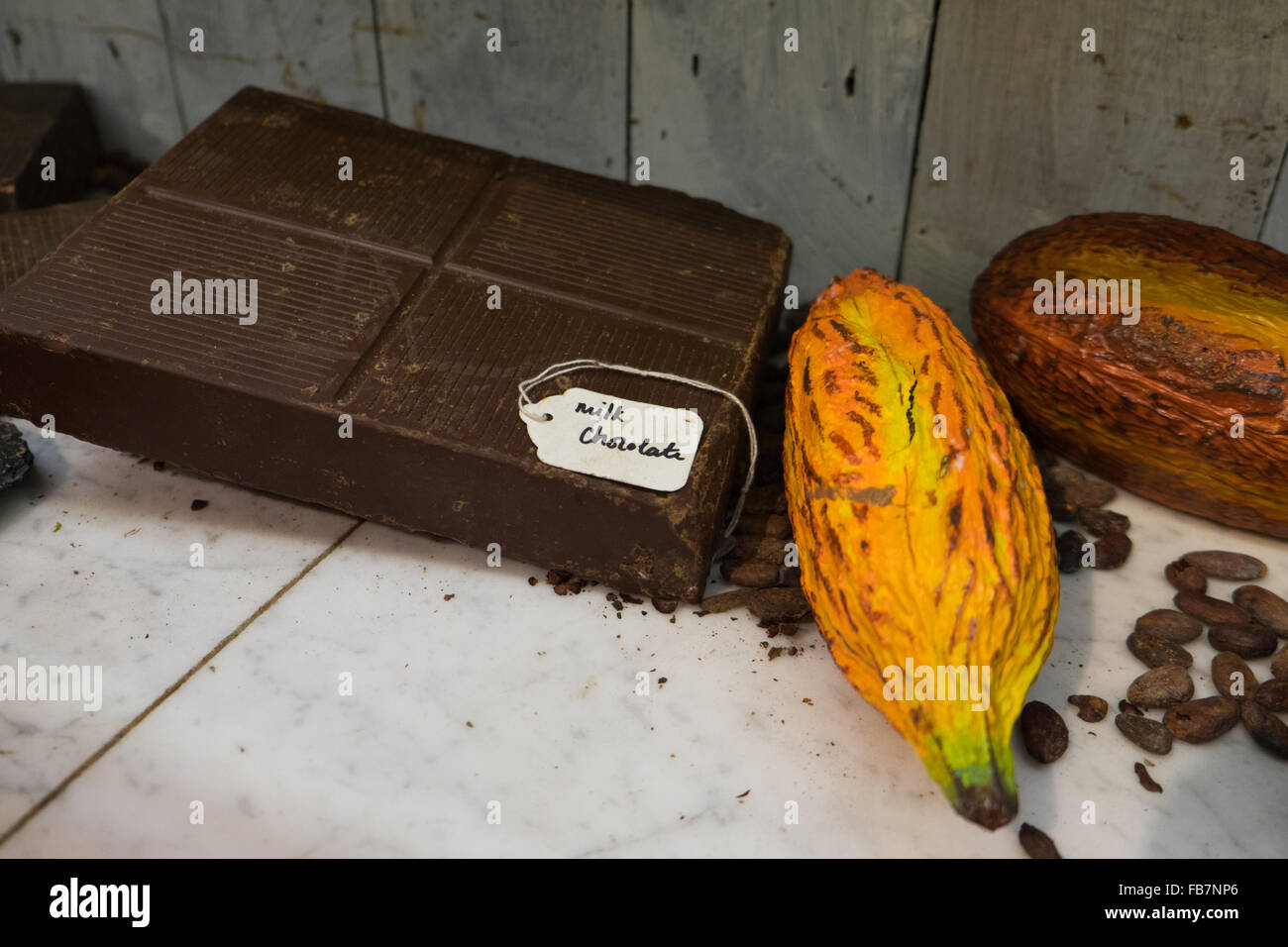 Milk chocolate bar and cacao pod Stock Photo Alamy