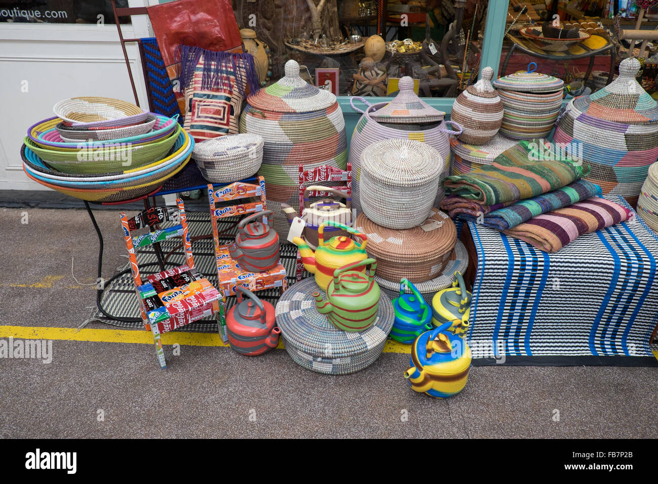 Brightly Coloured pots for sale: Brixton Market London England. November 2016 Stock Photo