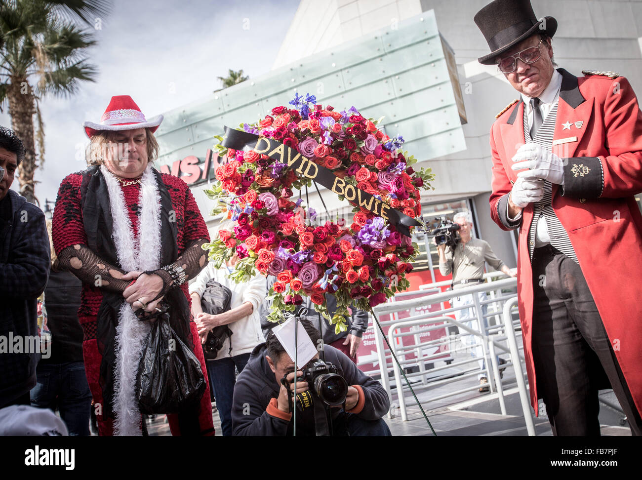 Fans pay tribute to David Bowie the day after his death at his star on ...