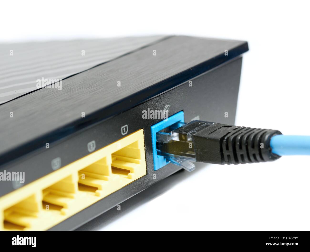 Blue ethernet cable plugs to the RJ45 port in the wireless router Stock  Photo - Alamy