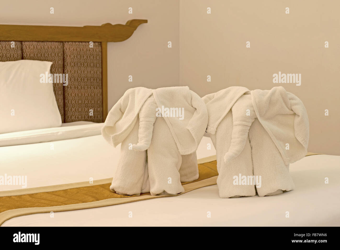 elephant shaped of towel on the bed Stock Photo Alamy