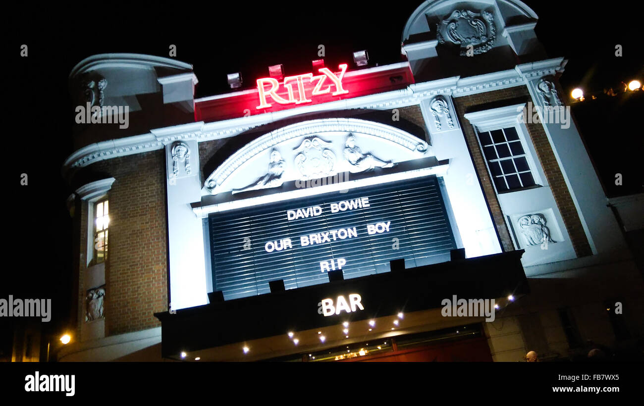 Brixton, London, Monday 11th January 2016.  Following the announcement of David Bowie's death from cancer, residents of Brixton, the birthplace of David Bowie, organise memorials, celebrations and street parties in honour of the life and music of the great British icon.  Pictured - the locakl cinema, The Ritzy, annoubces the death of David Bowie with the words, 'David Bowie, Our Brixton Boy, RIP' Credit:  David Stock/Alamy Live News Stock Photo