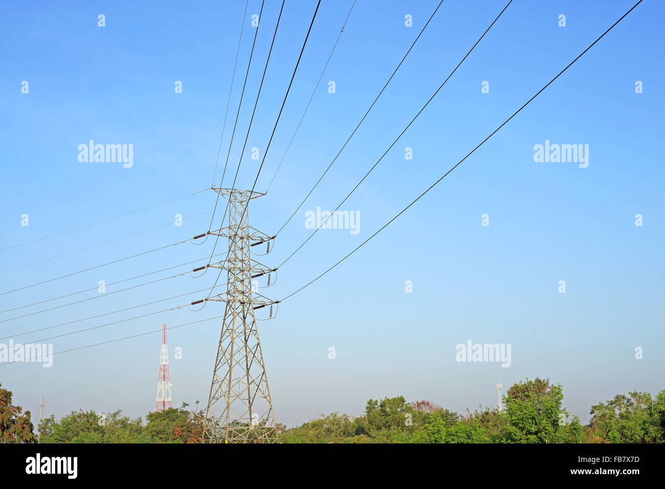 High voltage electric tower on beautiful sky background Stock Photo - Alamy