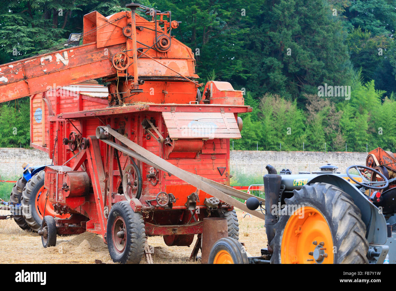 Old straw baler, agricultural vehicle, rural life Stock Photo