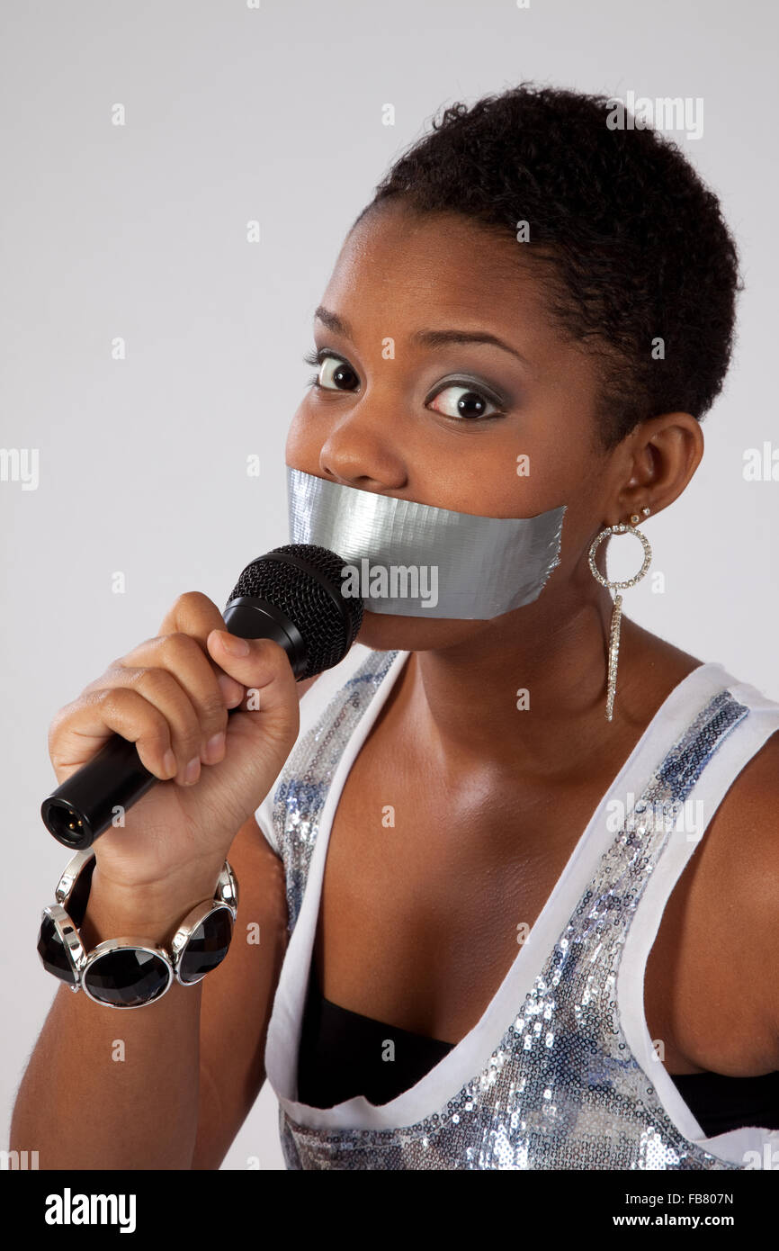 Woman mouth gagged with tape hi-res stock photography and images - Alamy