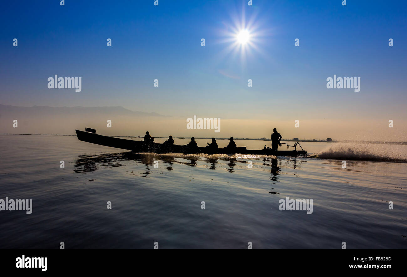 Silhouette of boat at sunset Inle Lake Burma Myanmar Stock Photo - Alamy