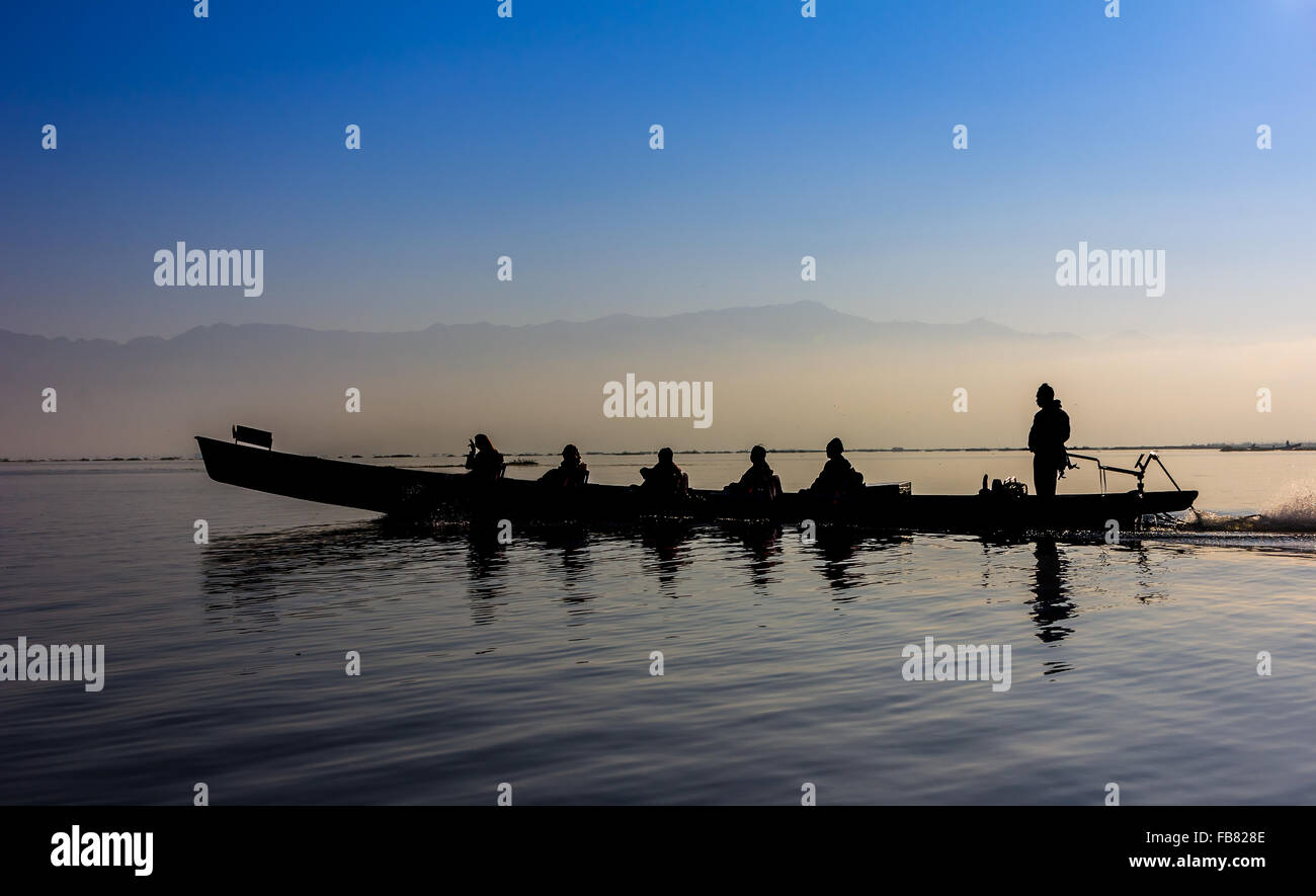 Silhouette of boat at sunset Inle Lake Burma Myanmar Stock Photo - Alamy