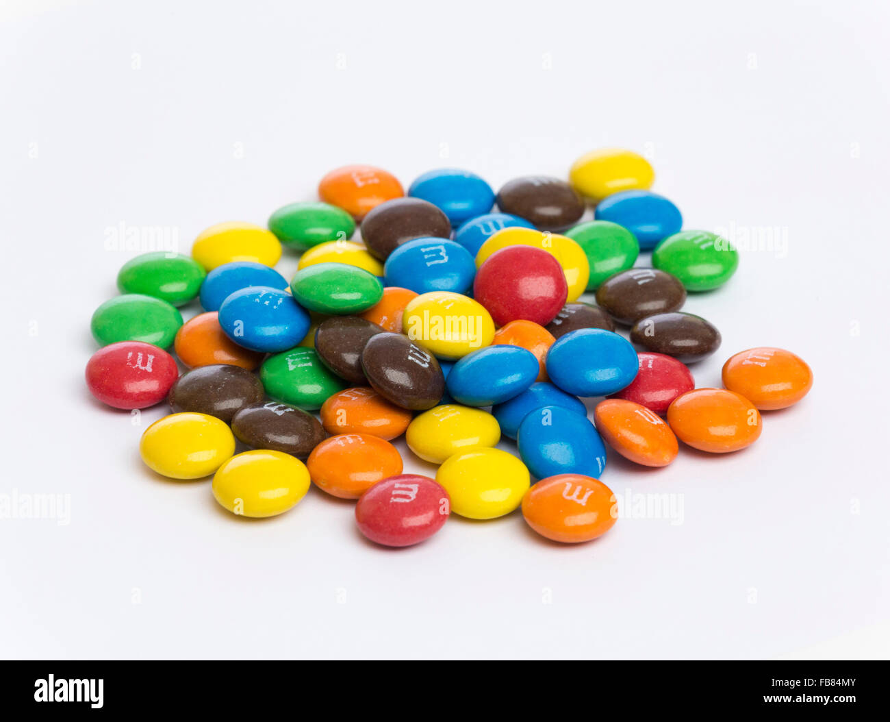 Travel Retail Edition Almond M&Ms in bowl Stock Photo - Alamy