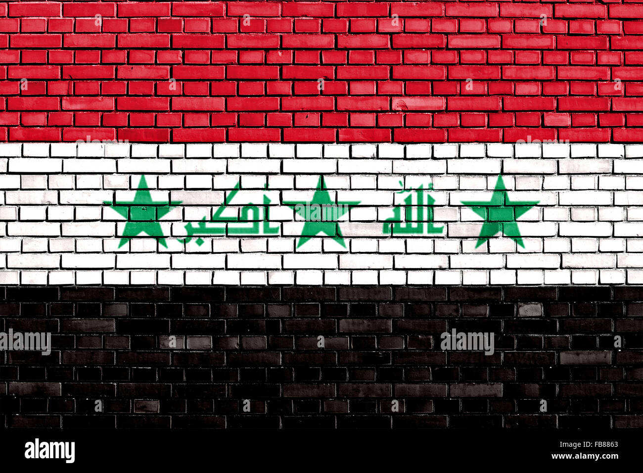 flag of Iraq painted on brick wall Stock Photo