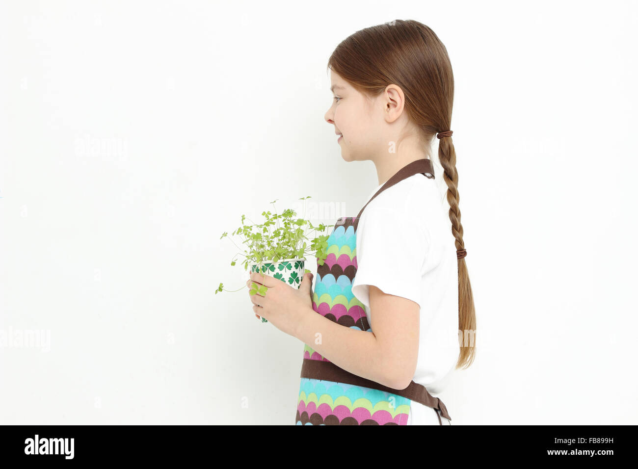 Kid holding parsley Stock Photo Alamy
