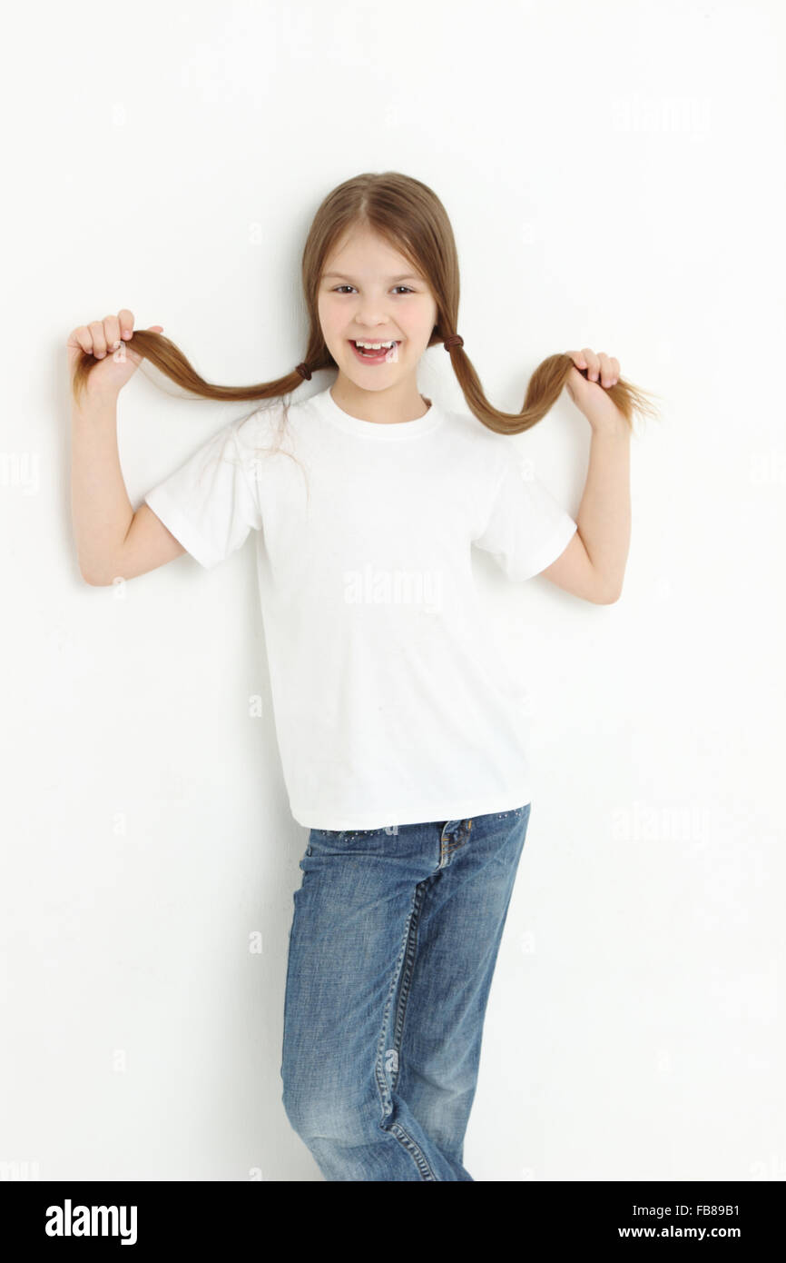 Smiley little girl with beautiful hair Stock Photo