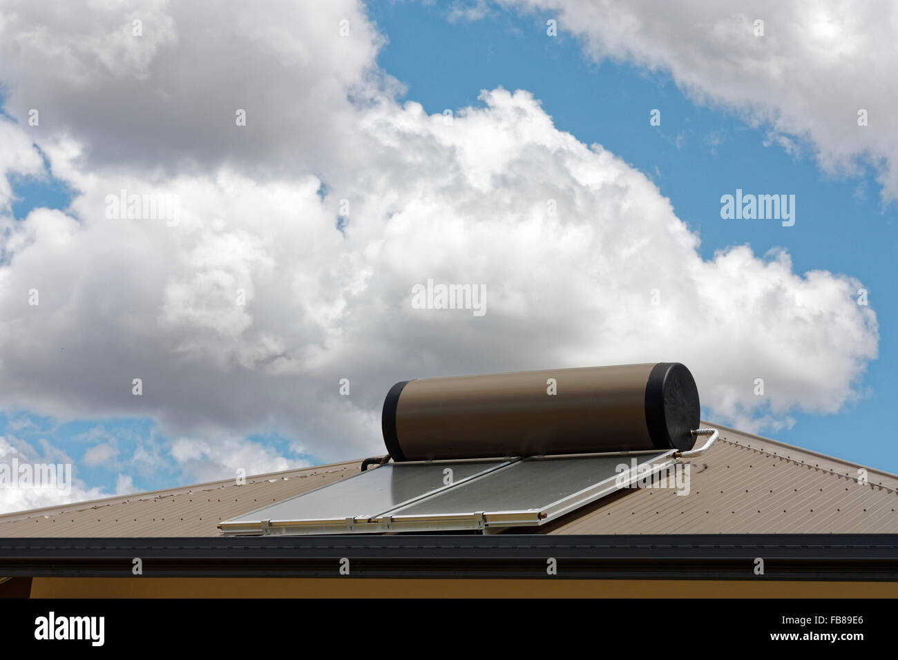 solar panels on roof to heat water from the sun Stock Photo