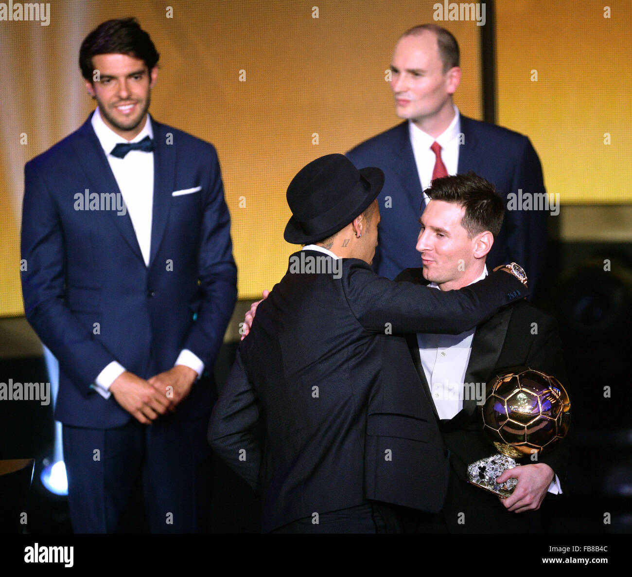 Argentina's Lionel Messi (front R) is congratulated by FC Barcelona's Neymar of Brazil, after winning the FIFA Men's soccer player of the year 2015 prize during the FIFA Ballon d'Or Gala 2015 held at the Kongresshaus in Zurich, Switzerland, 11 January 2016. Photo: Patrick Seeger/dpa Stock Photo