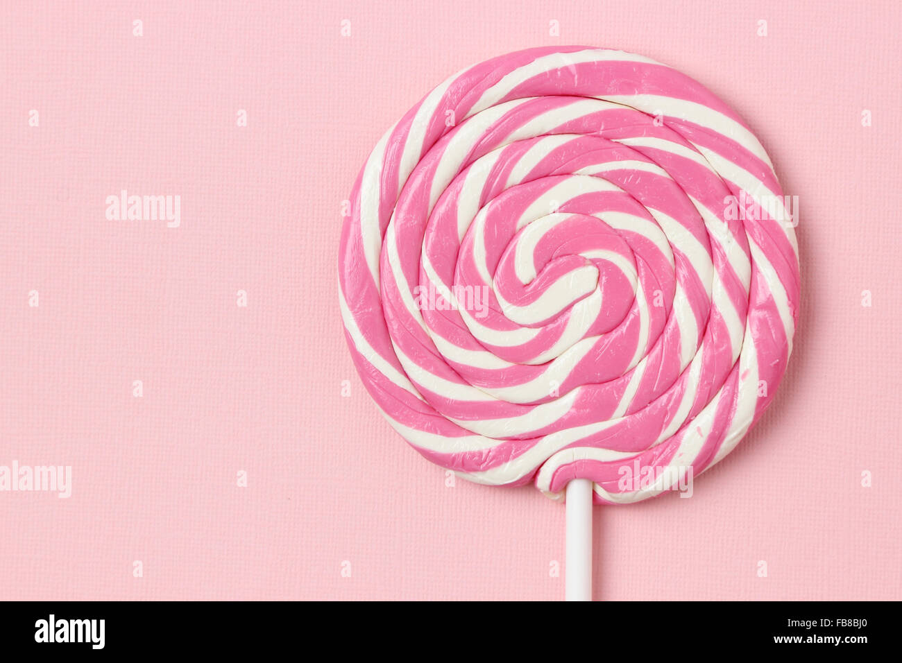 Sweet pink and white lollipop Stock Photo