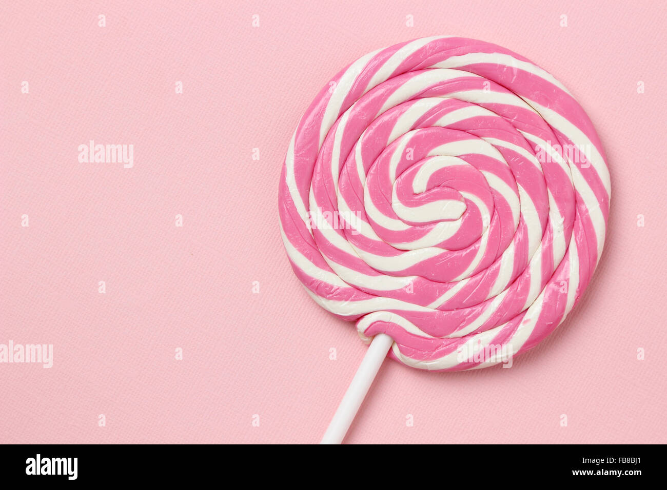 Sweet pink and white lollipop Stock Photo Alamy