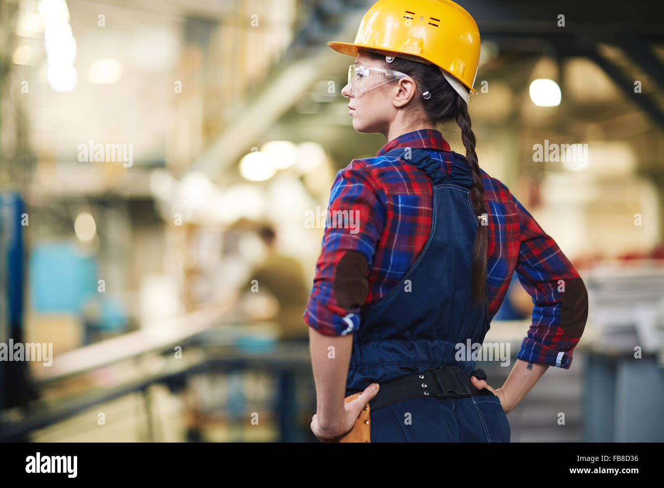 Business woman in protective helmet hi-res stock photography and images ...