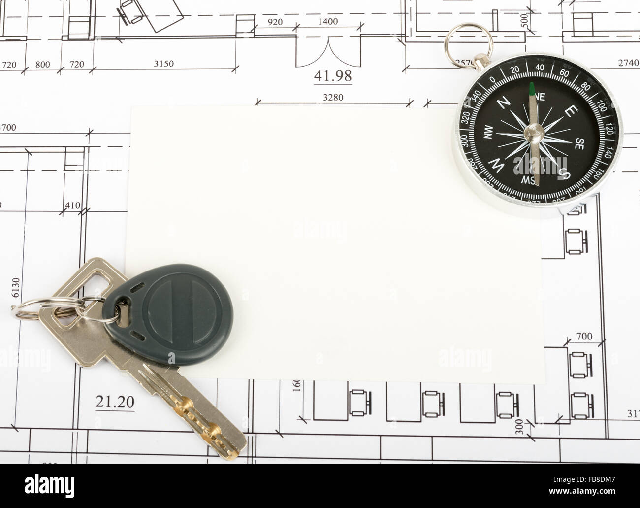 Compass on construction plan Stock Photo - Alamy