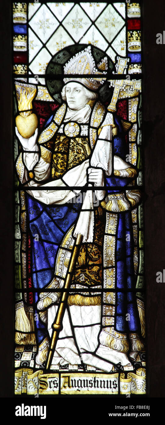 Stained glass window of 1897 by Burlison & Grylls depicting Saint Augustine of Hippo, St Peter's Church, Deene, Northamptonshire Stock Photo