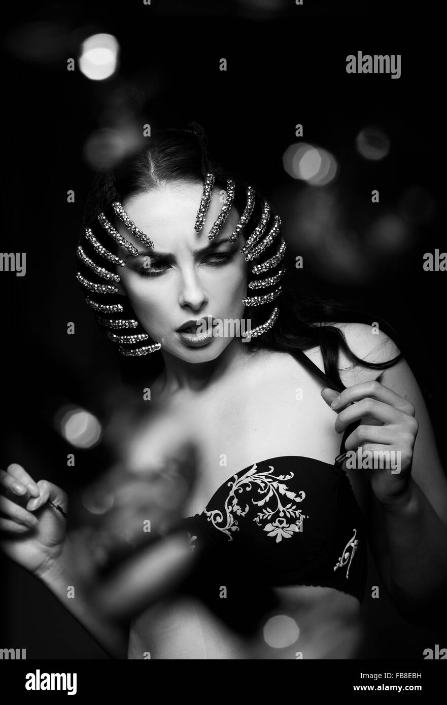 Black and white studio fashion portrait with glitter headpiece Stock Photo