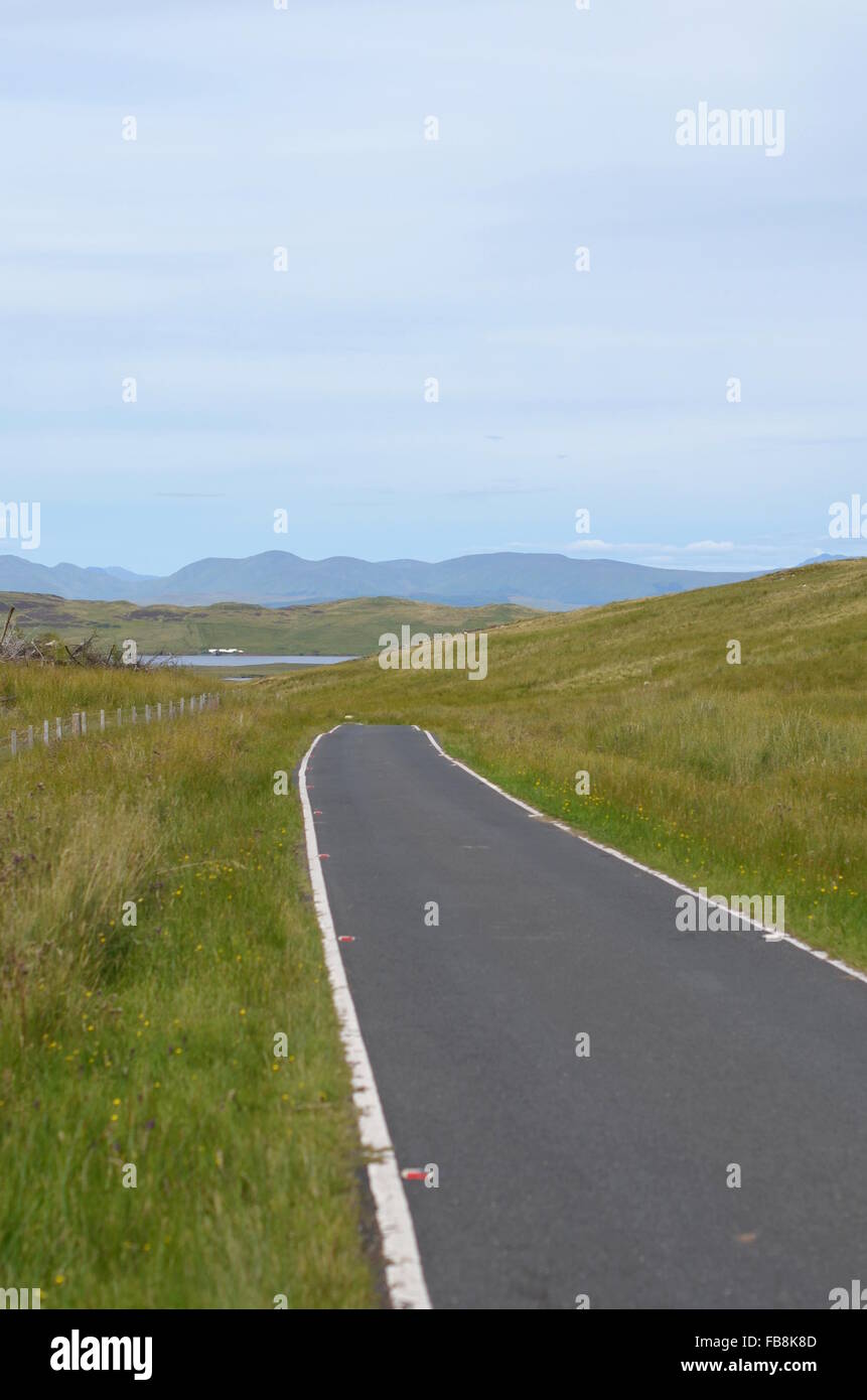 Road leading towards Loch Thom in Clyde Muirshiel Regional Park, Scotland Stock Photo