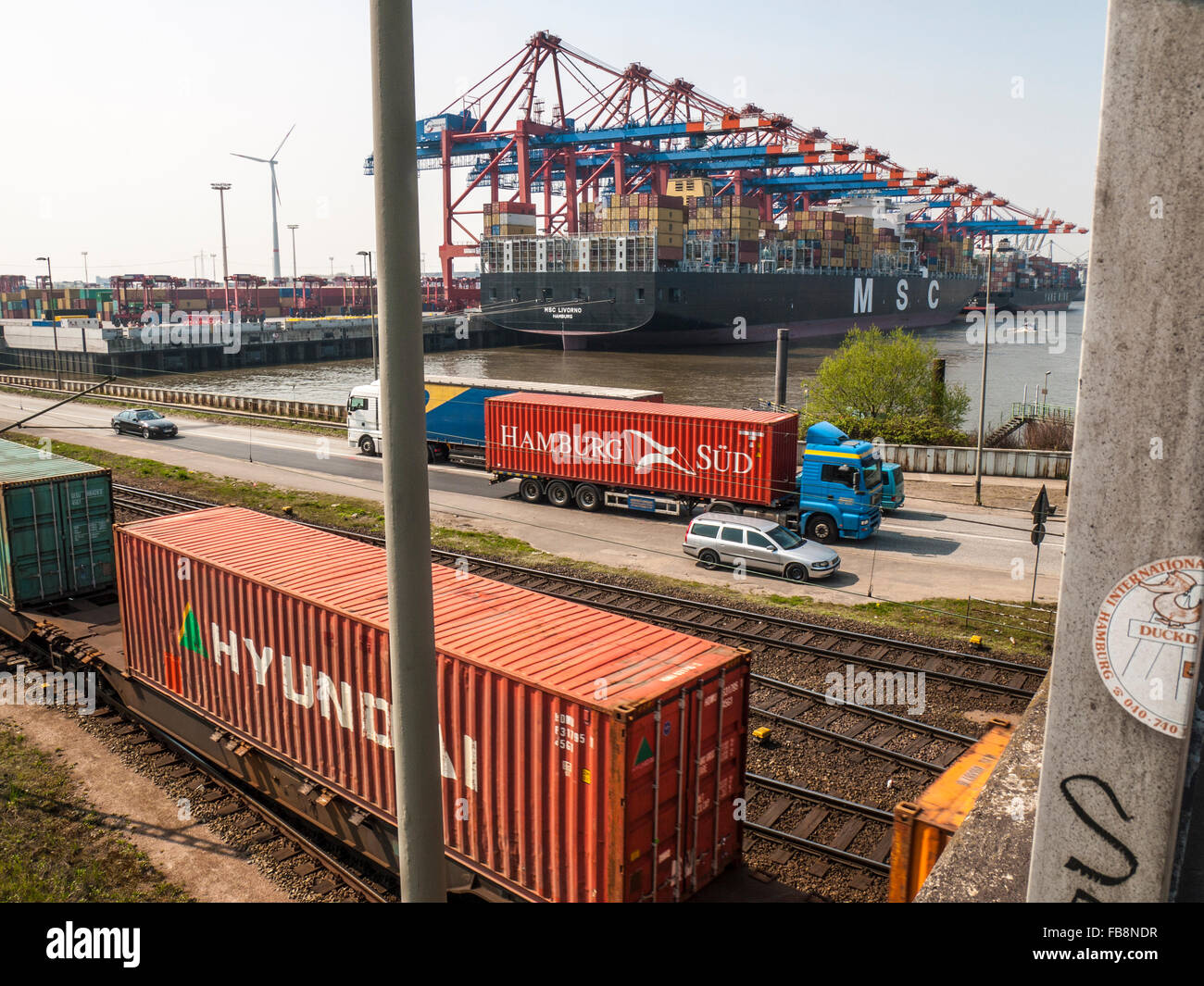 Container haulage in the Port of Hamburg, Germany. Stock Photo