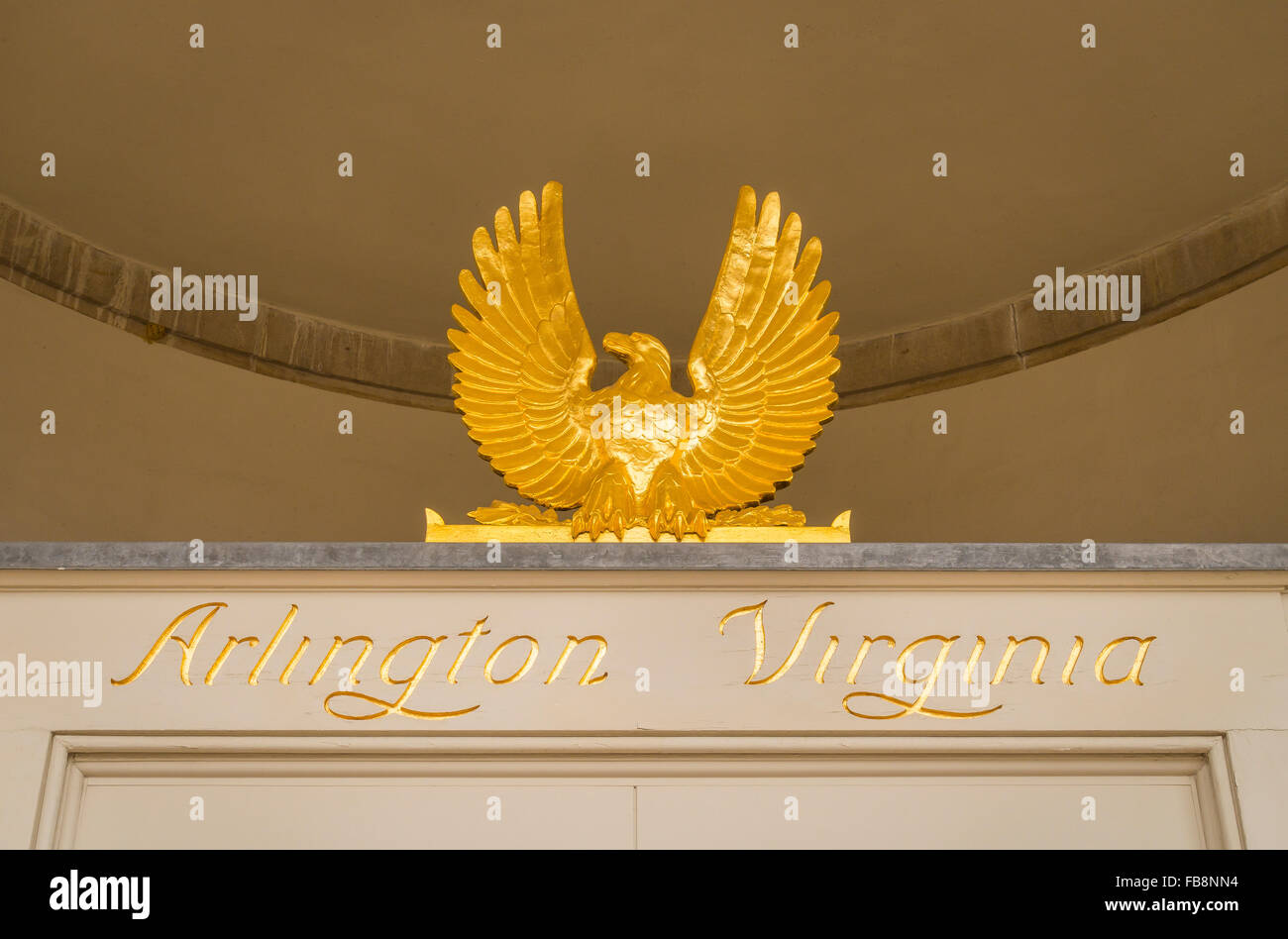 ARLINGTON, VIRGINIA, USA - Gold leaf eagle and name over Post Office door, in Clarendon neighborhood. Stock Photo