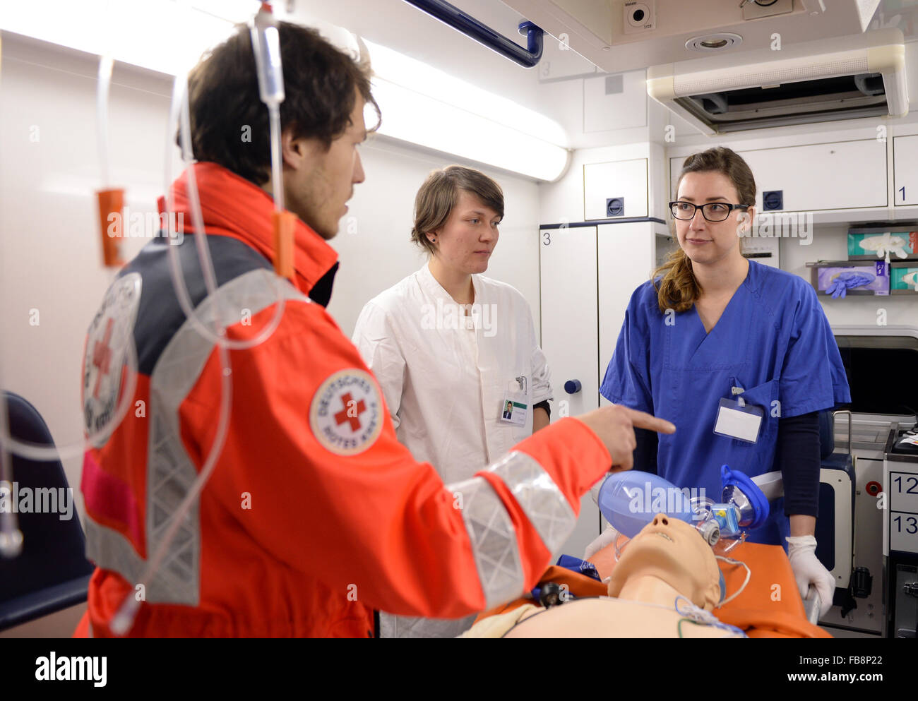 Berlin, Germany. 09th Jan, 2016. Medical students Ann-Sophie and Anja-Kathrin train for ambulance transport during the training exercise 'Simulierte Rettungsstelle' (lit. simulated emergency room), at the Charite teaching hospital in Berlin, Germany, 09 January 2016. In groups of five, students train for real situations in the emergency room. PHOTO: BRITTA PEDERSEN/DPA/Alamy Live News Stock Photo