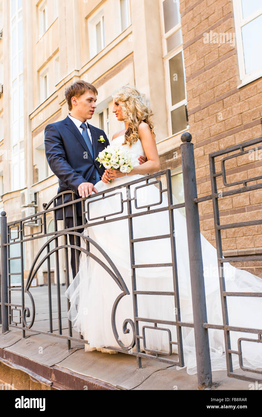 Happy bride and groom on their wedding day Stock Photo - Alamy