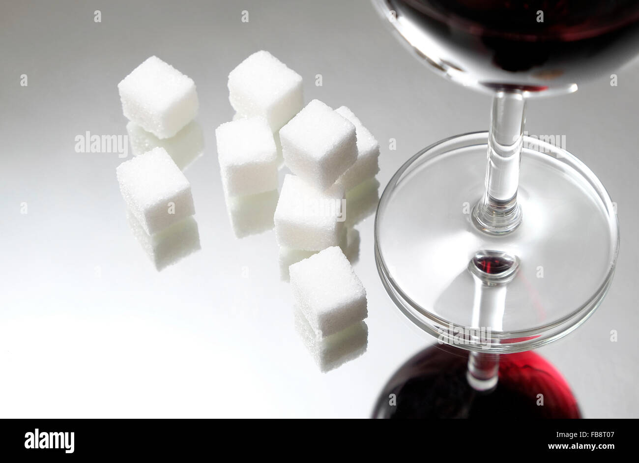 Sugar in a glass of wine