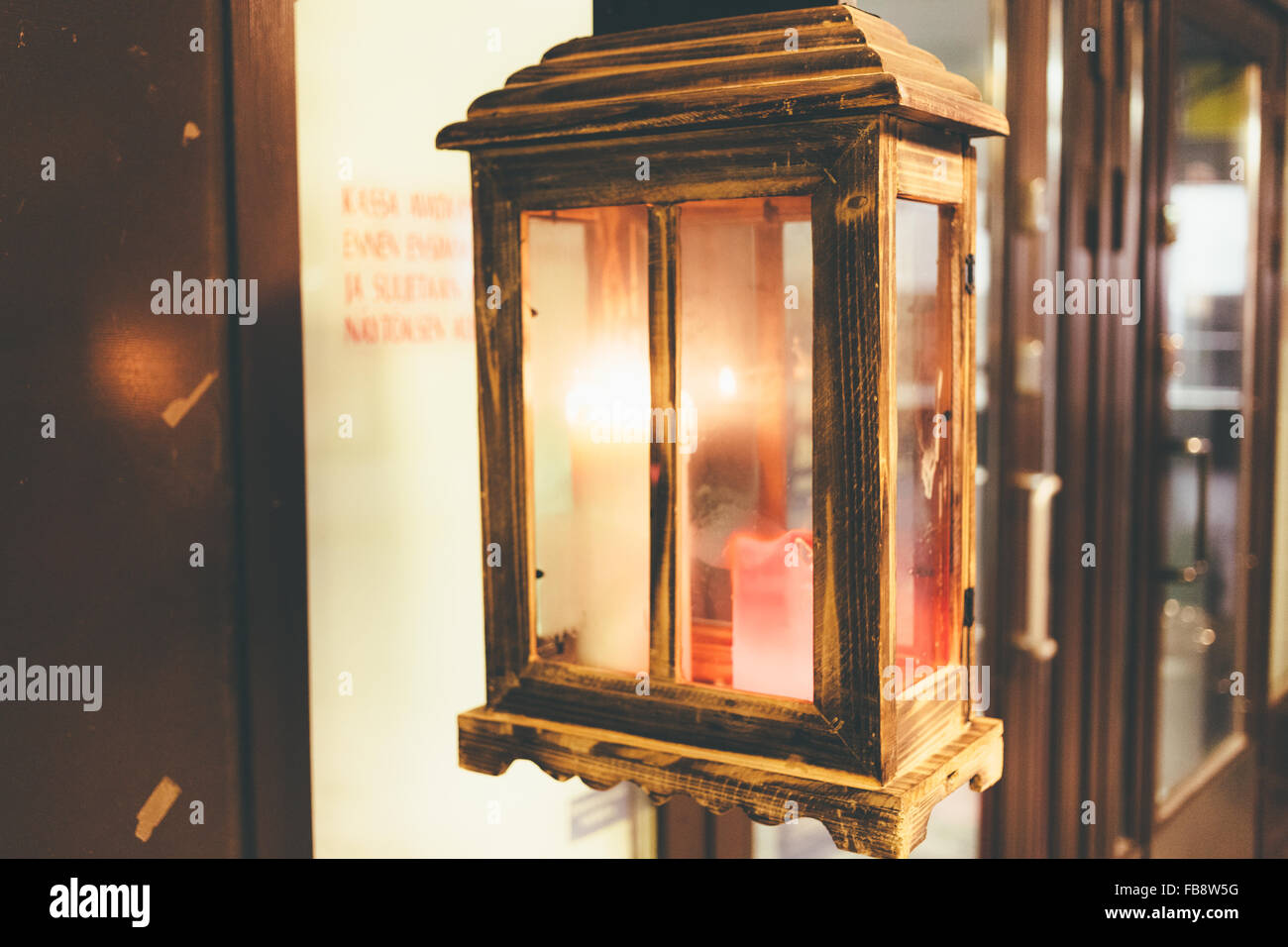 Burning Candle In A Glass Box On The Street Before An Institution At Night Stock Photo Alamy
