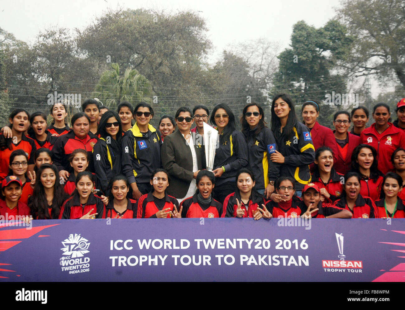 Lahore. 12th Jan, 2016. Pakistani women cricketers pose for a photograph with the ICC 2016 World Twenty20 trophy during a ceremony in eastern Pakistan's Lahore on Jan. 12, 2016. The International Cricket Council (ICC) 2016 World Twenty20 trophy has reached Pakistan for a two-day tour. Credit:  Sajjad/Xinhua/Alamy Live News Stock Photo