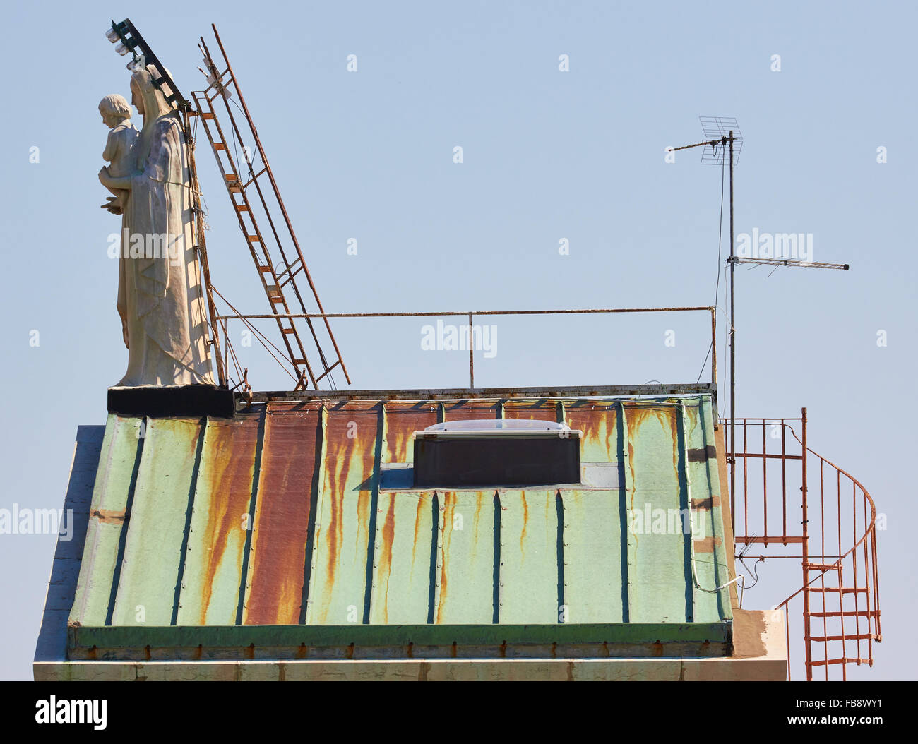 Statue of Virgin Mary and child on roof of Chiesa Santa Maria Della Grazie church San Giovanni Rotondo Apulia Puglia Italy Stock Photo