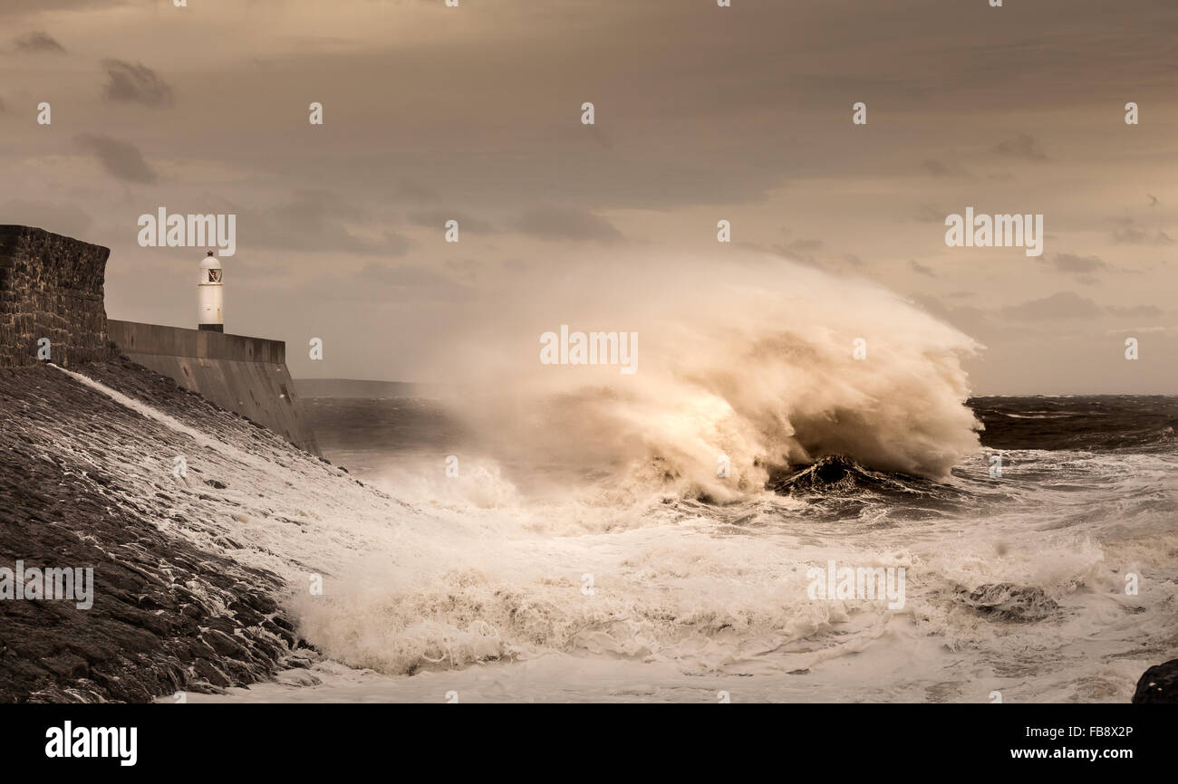 Storm Desmond hits Porthcawl and crash into the lighthouse and pier in South Wales, UK. Stock Photo