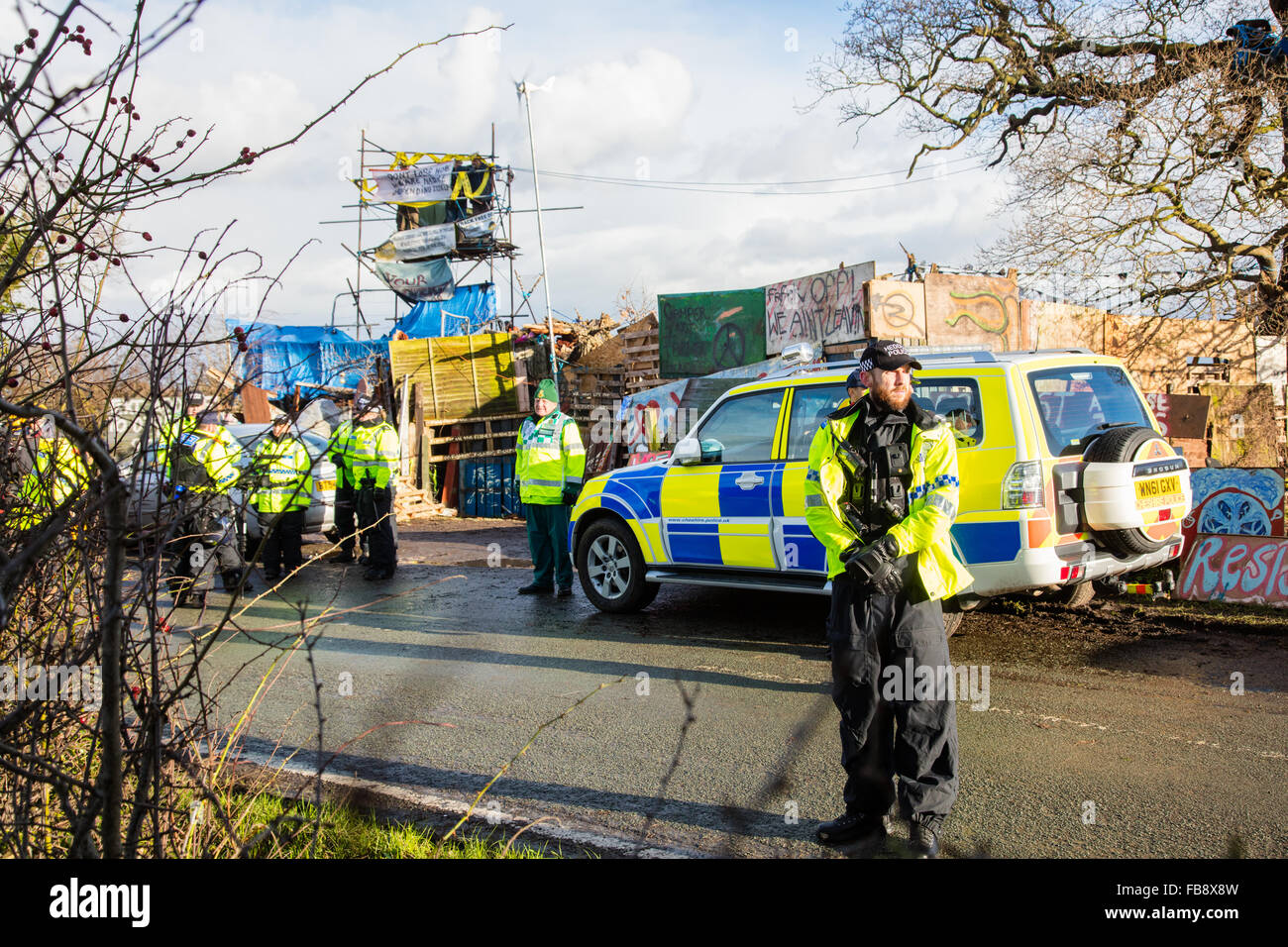 Upton, Cheshire. 12th Jan, 2016. The heavy police presence at Upton anti fracking camp as bailiffs and policemove in to evict the camp  Credit:  Jason Smalley / Alamy Live News Stock Photo