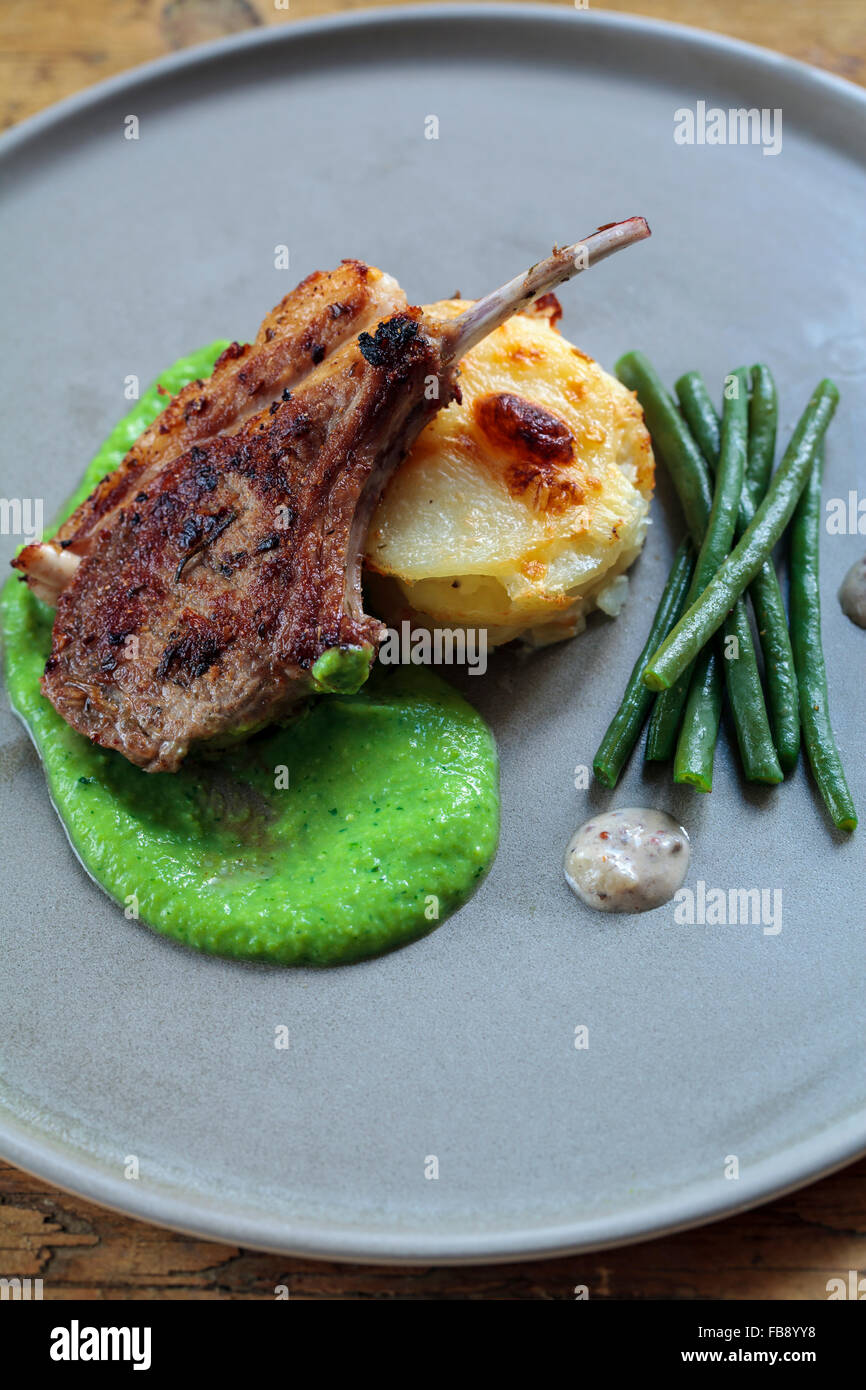 Lamb chop with peas puree and dauphinoise potatoes Stock Photo Alamy