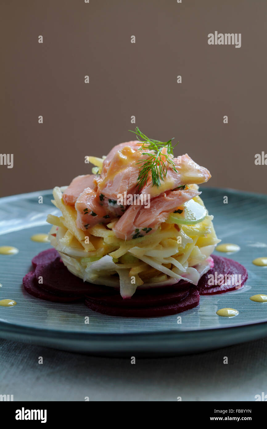 Salad with smoked trout, fennel, apple and beetroot Stock Photo