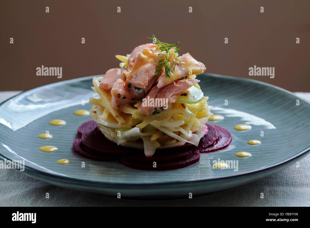 Salad with smoked trout, fennel, apple and beetroot Stock Photo
