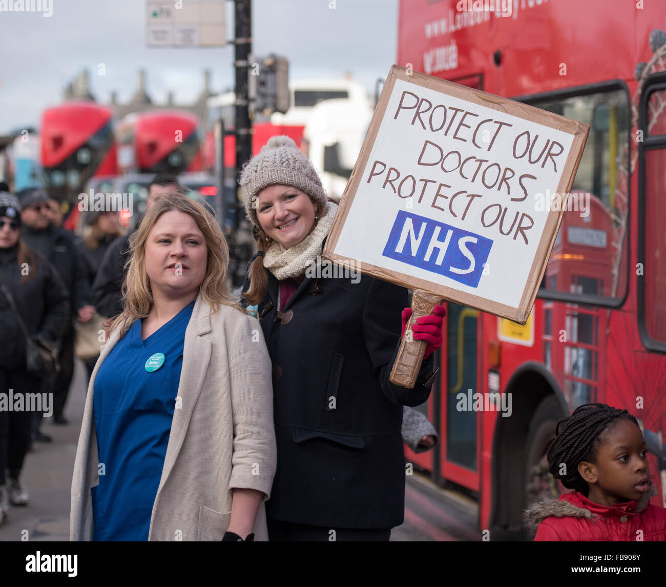 Two junior Doctors picketing outside St Thomas' Hospital , Westminster, London Stock Photo