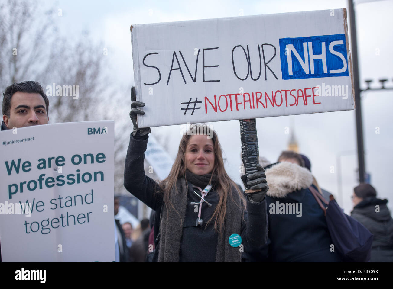 St Thomas’ Hospital, London, UK. 12th January, 2016. Save our NHS banner held by a Junior Doctor Credit:  Ian Davidson/Alamy Live News Stock Photo