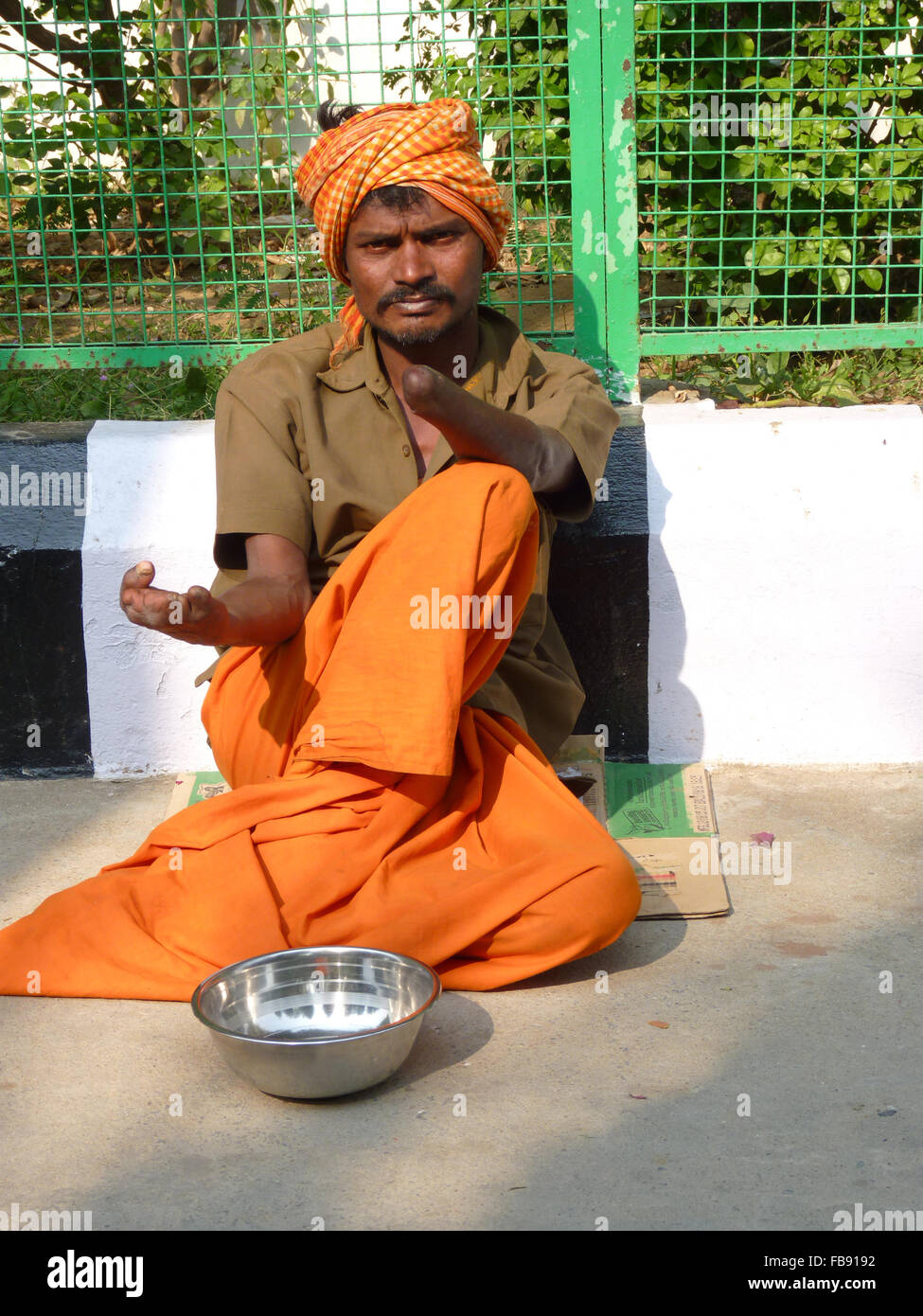 Handless beggar hires stock photography and images Alamy