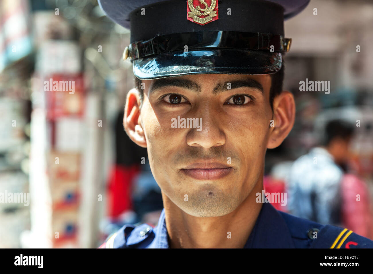 A young policeman on the streets of Thamel in Kathmandu Stock Photo
