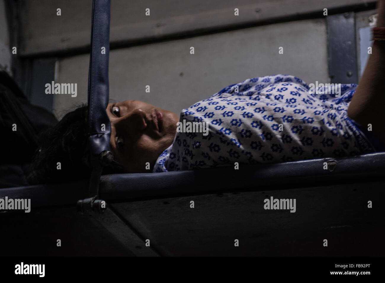 Sleeping and resting on the train. Indian Railways, India. Stock Photo