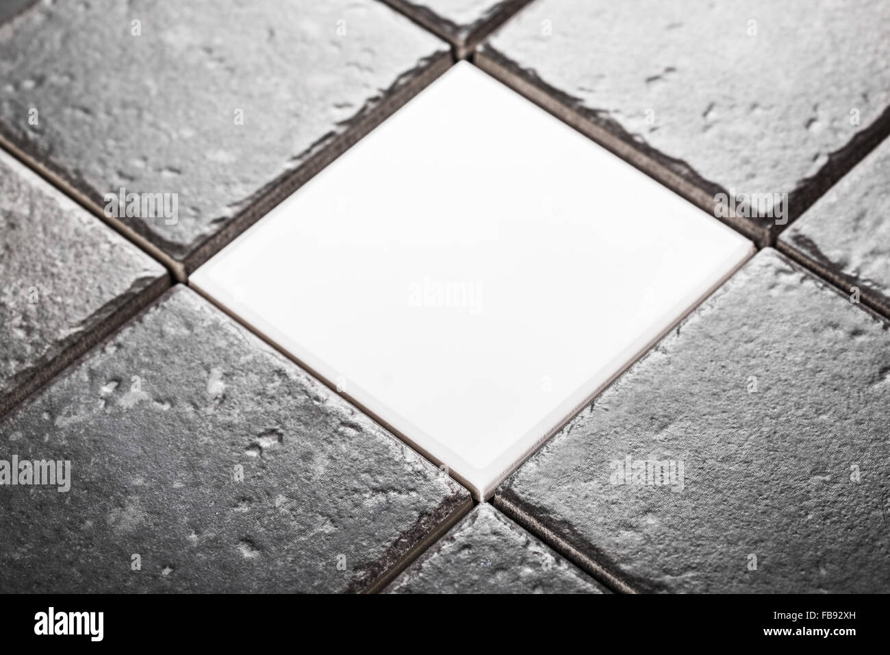the background of gray ceramic tiles closeup Stock Photo