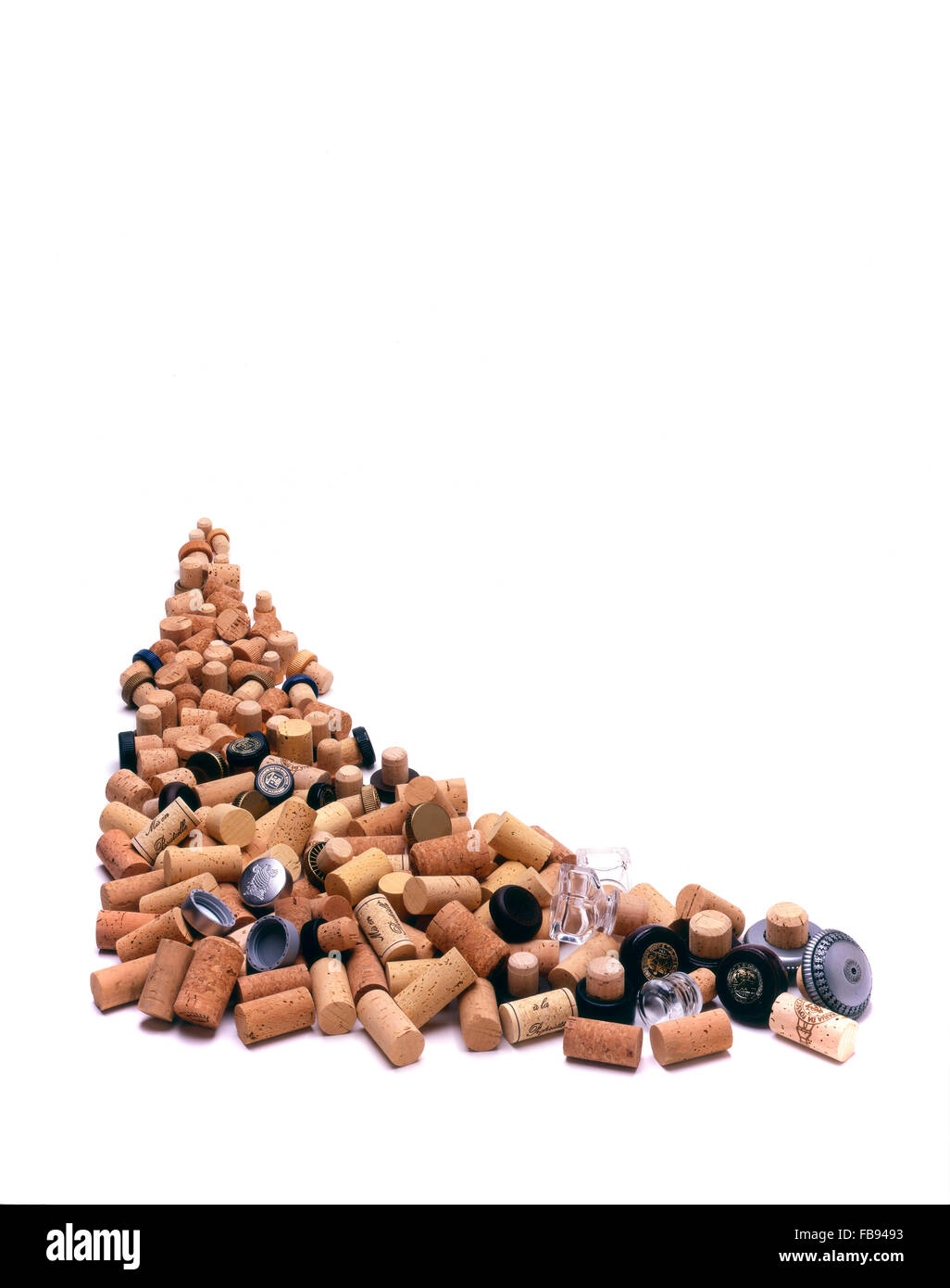 Corks. Dozens of corks and cork stoppers cascading towards the camera on a white background Stock Photo