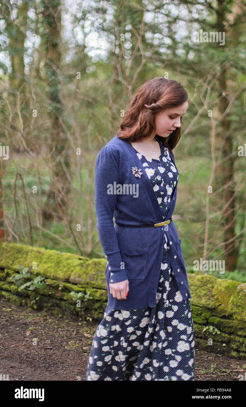 Young woman walking down a country lane Stock Photo - Alamy