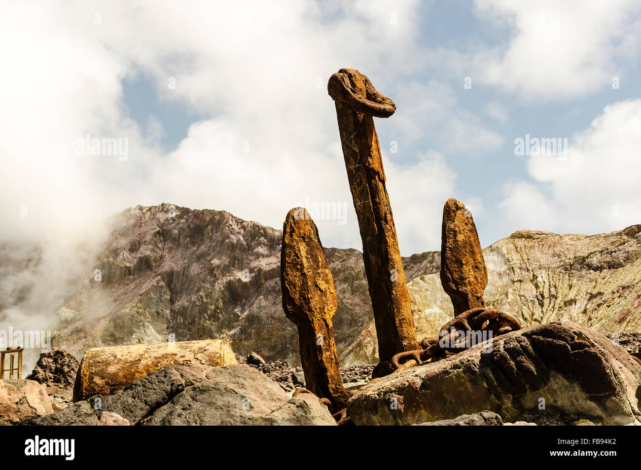 old, rusty anchor on the White Island is a monument to the mining history of sulphur on the island Stock Photo