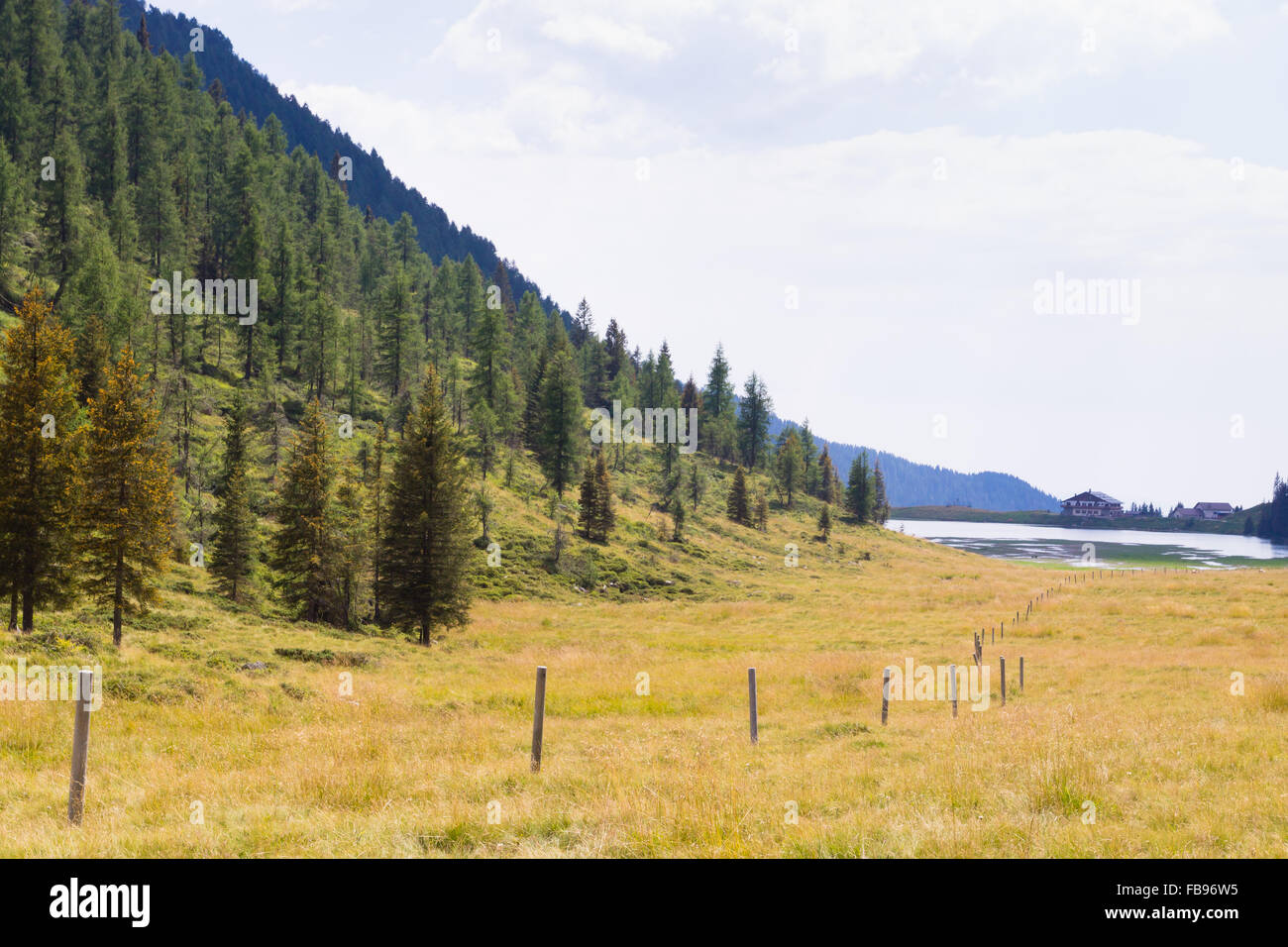 Beautiful alpine panorama, group Pala of dolomites from Calaita lake, Italian landscape Stock Photo