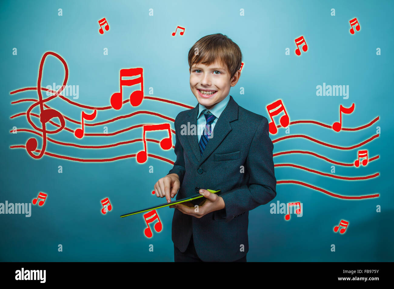 adolescent boy smiling businessman holding a tablet sketch preve Stock Photo