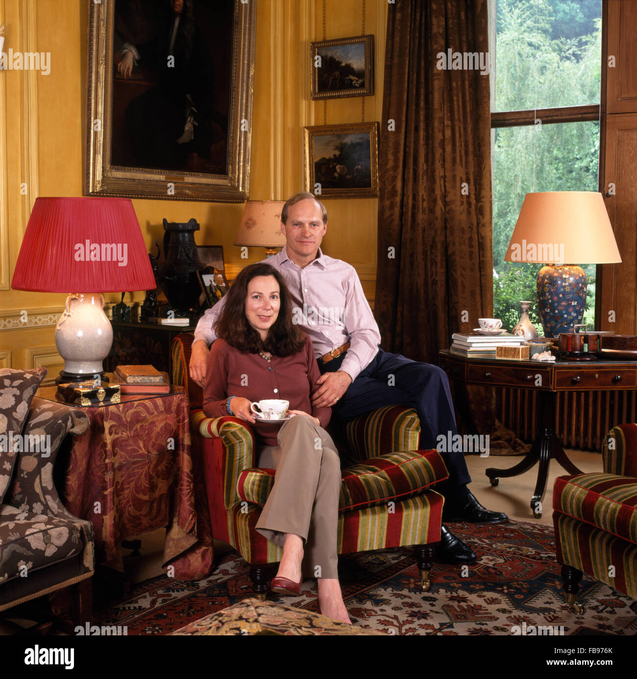 Portrait of a couple sitting in a country drawing room         FOR EDITORIAL USE ONLY Stock Photo
